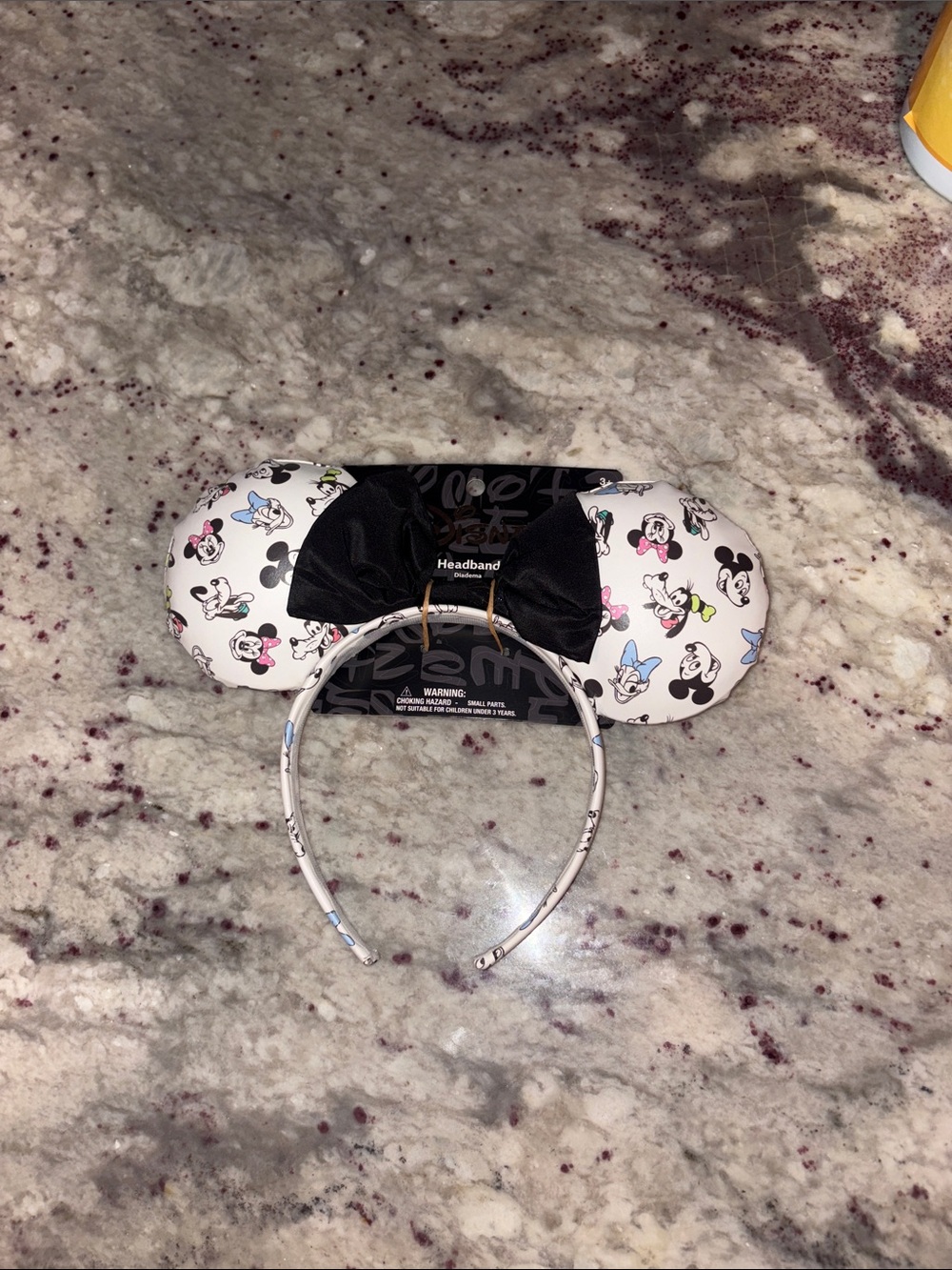 Disney White Minnie Ear Headband with Black Bow and Multicolor Character Print